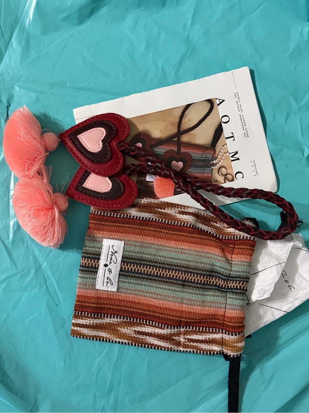 Nena & Co. Multicolor Striped Crossbody with Pink Tassel Hearts
